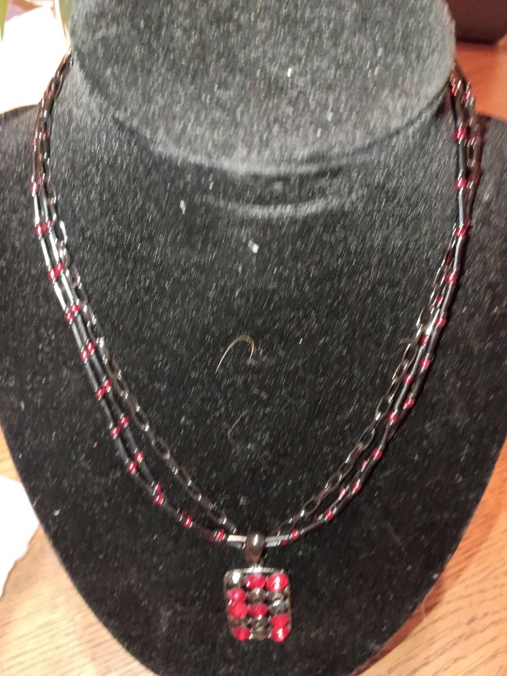 Handcrafted Red and Black Beaded Necklace with Pendant